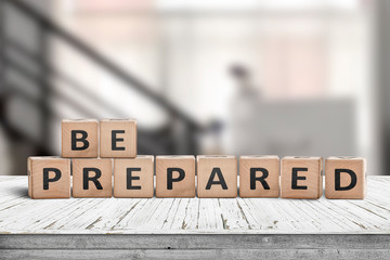 Be prepared phrase on wooden dices in a bright room