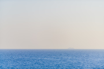 Fototapeta premium Ocean, sky and lonely ship. Creative sketches. Tenerife. Canary Islands..Spain