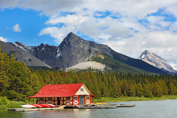 Fototapeta na wymiar Boat House at Maligne Lake. Maligne Lake is a lake in Jasper National Park, Alberta, Canada.