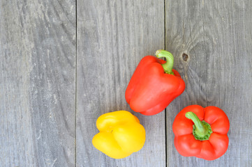 Sweet pepper on wooden rustic vintage grey background. The concept of healthy eating