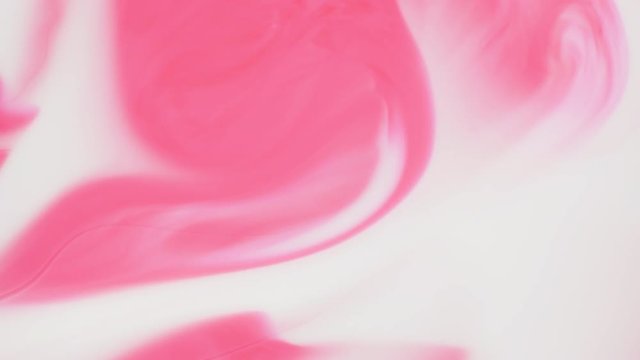 Colored paint beautiful spread in liquid, realtime shot