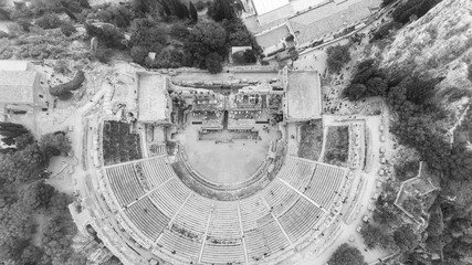 Aerial view of ancient Greek amphitheater in Taormina,Siciliy,Italy. Greek theatre aerial view, popular sight seeing destination in Sicily.