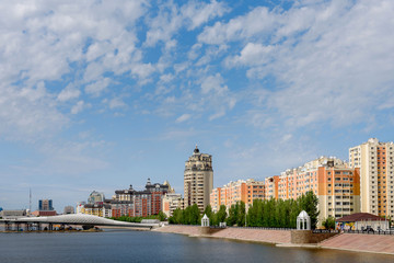 Fototapeta na wymiar Residential complex on the embankment in Astana