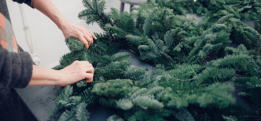 Christmas tree wreath decorating workshop DIY set scissors for making on table