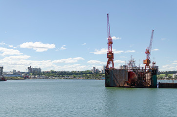 cranes in dry dock in the seaport