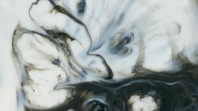 Colored paint beautiful spread in liquid, realtime shot