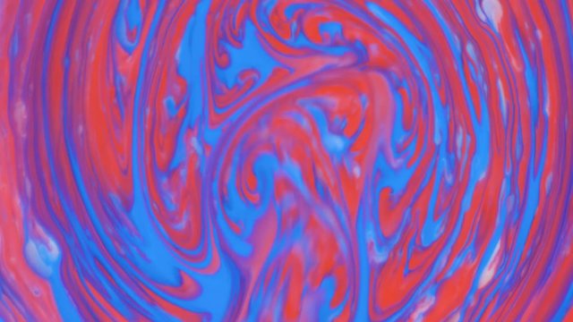 Colored paint beautiful spread in liquid, realtime shot