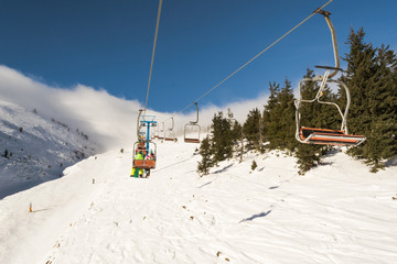 winter morning on chairlift ski resort