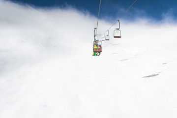Fototapeta na wymiar winter morning on chairlift ski resort
