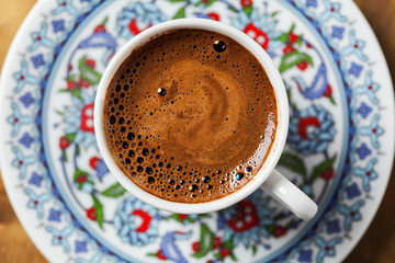 Black coffee in traditional Turkish cup - obrazy, fototapety, plakaty