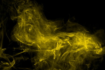 Yellow smoke on black background