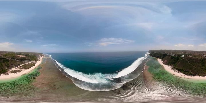 vr360 sea coast with tropical beach. aerial view surf, waves crushing on coral reef. Bali,Indonesia, travel concept. aerial footage