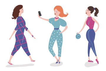 Group of fashionable girls walking and posing