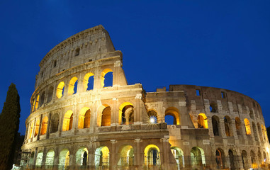 Fototapeta na wymiar The legendary Coliseum at night , Rome, Italy