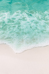 Sandy beaches and beautiful ocean waves For natural background Pastel tone