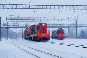 shunting diesel locomotives during snowfall