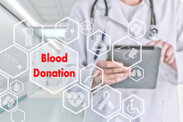 Blood Donation on the touch screen with icons on the background blur medicine Doctor in hospital.Innovation treatment, service, health data analysis. Medical Healthcare Concept 