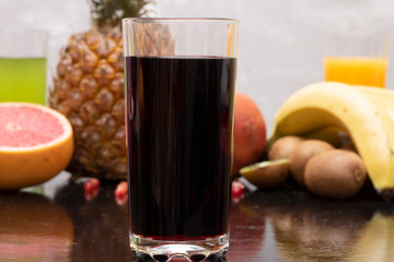 fresh pomegrante juice, exotic fruit background