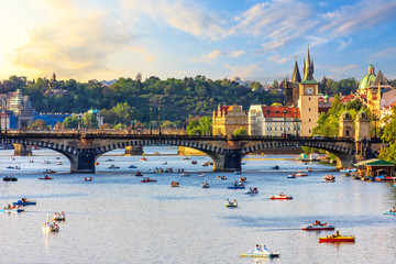 Boating in the centre of Prague near Old Town and Manes bridge - obrazy, fototapety, plakaty