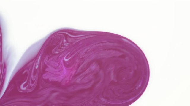 Colored paint beautiful spread in liquid, realtime shot