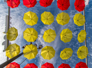Fototapeta na wymiar Christmas time in Torrox Spain with colorful umbrellas - feliz navidad