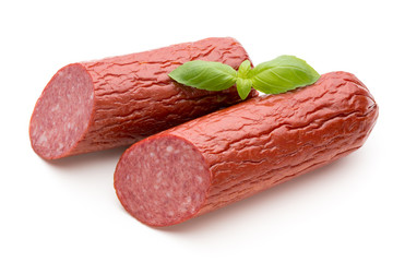 Salami smoked sausage, basil leaves on white background cutout.