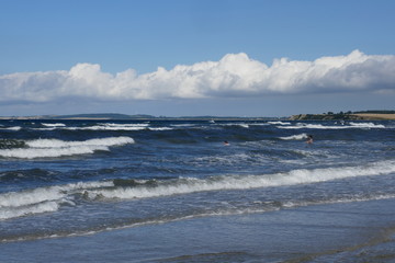 Swimming in the sea. Holiday on the Baltic coast in Schleswig-Holstein, Germany
