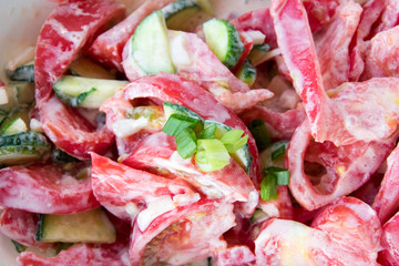 tomato salad with onion and sour cream