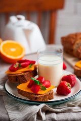 Cheese and strawberry sandwiches and soy milk.Healthy breakfast.