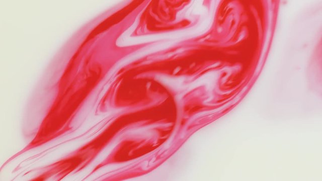 Colored paint beautiful spread in liquid, realtime shot