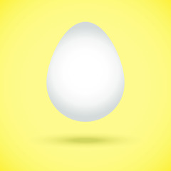 Vector image of a white egg on a yellow background