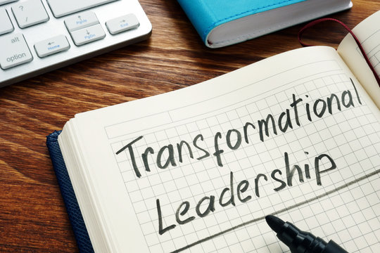 Transformational leadership handwritten in a notepad.