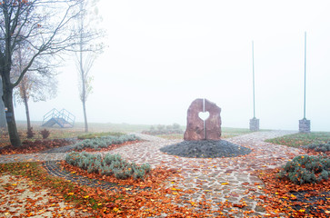 Statue at lake Balaton on a foggy day