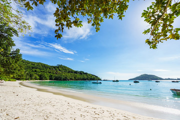 beautiful lagoon with boats at port launey, seychelles 7