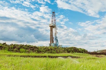Drilling rig in oil field for drilled into subsurface in order to produced crude. Petroleum Industry
