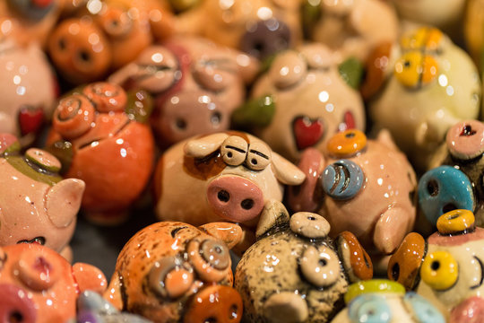 Ceramic souvenir toy in the year of the pig. Counter with gifts.