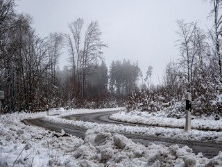 Image of foggy and snowy winter road