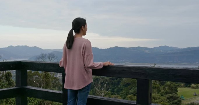 Woman tourist enjoy the view at luye highland in Taitung