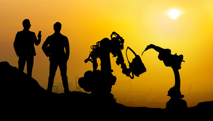 Silhouette of business man command automation robot arm machine technology , industry 5.0 ,...