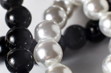 White and black pearls in a necklace, large
