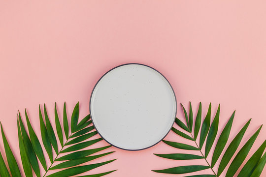 Empty Plate Mockup With Green Tropical Leaves