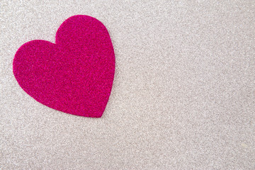 Obraz premium Simple Background with a Glittery Love Heart Pefect for Adding a Message of Devoation