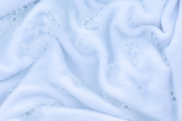 Soak a cloth before washing, white cloth. top view