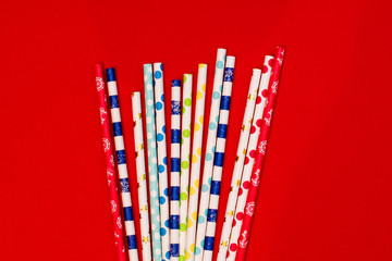 cocktail tubes for drinks on a red background