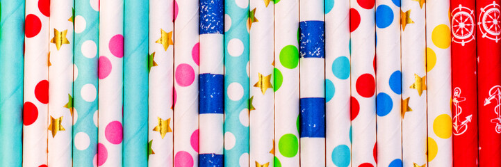 colorful straws for cocktails. background. banner
