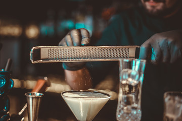 Cocktail Preparation. The barman is preparing a drink.