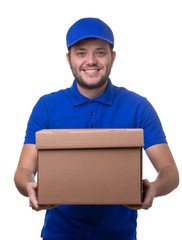 Photo of happy man in blue t-shirt and baseball cap with cardboard box