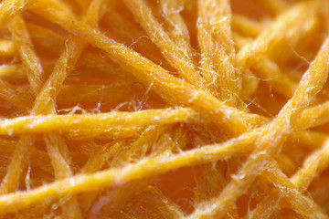 close up of ball of wool with dried glue