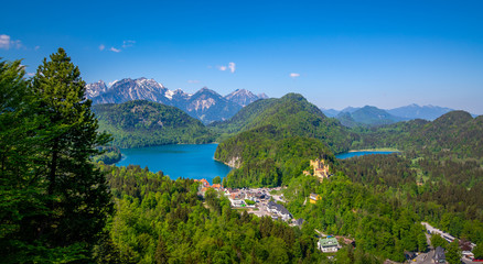 Fototapeta premium Hohenschwangau Castle with Alpsee and Schwansee, Bavaria, Germany