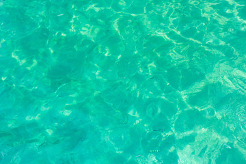 Sea water surface in sunshine.